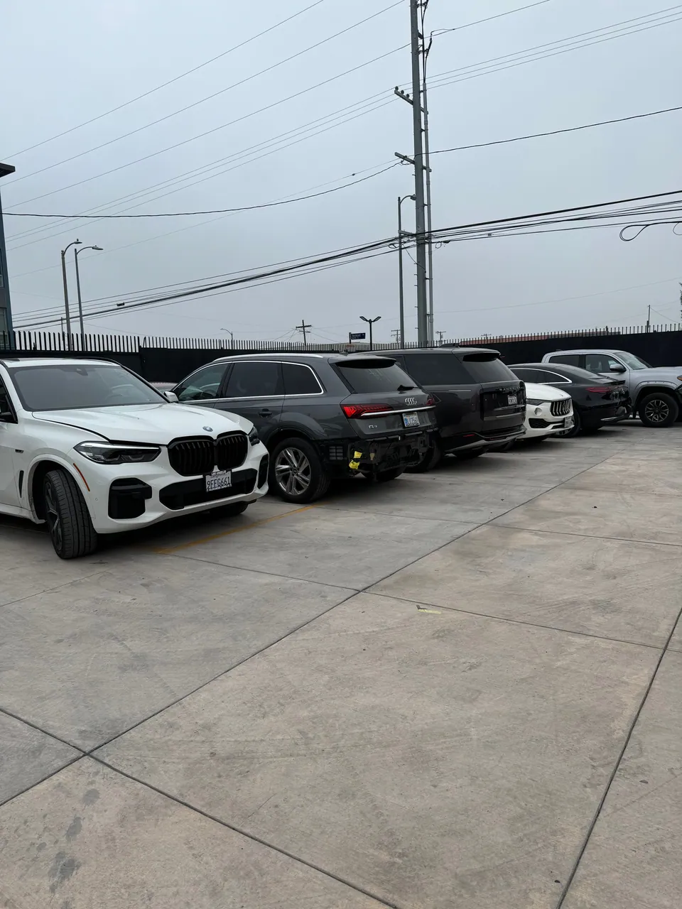 SUVs lined up in the Aramex Body Shop lot